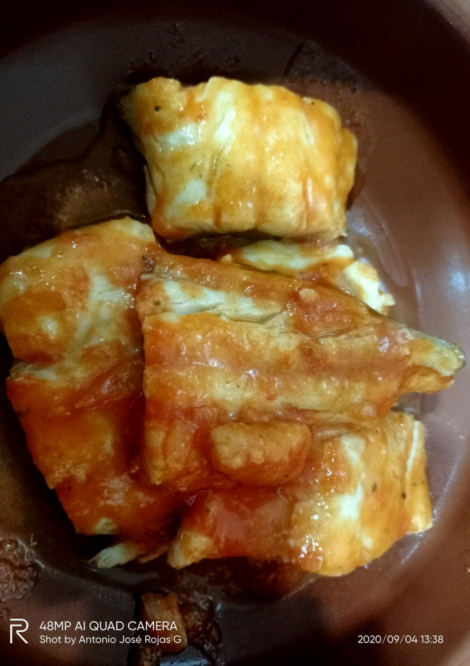 Una foto de Bacalao con tomate e invitados 🌶️🐟 🍅 🦐🦐🍷