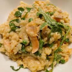 A picture of Salmon, pea and arugula risotto.