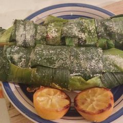 A picture of Salt cured, leek wrapped trout, stuffed with couscous pilaf.