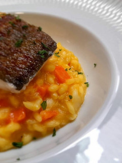 Una foto de Risotto de calabaza con bacalao