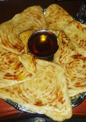 صورة لوصفة مسمن مثلثات المعسل🍯🍯 بالفرينة