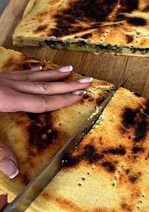 Une photo de Kesra épinard ricotta