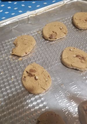 A picture of Peanut Butter Cookies with chocolate chips and walnuts.