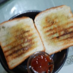A picture of Garlic and corn sandwich.