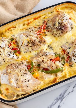 Una foto de Rolls de merluza con vegetales y crema al horno