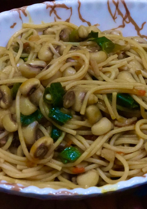 A picture of Spaghetti and beans.