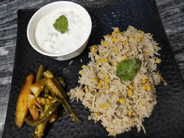 Easy Steps to Prepare Chana Dal khichdi with boondi ratia and aloo bhindi which So Delicious