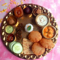 A picture of Maharashtrian Special Shrikhand Puri Thali.
