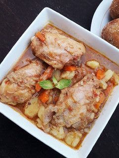 A picture of Hot carrot and potato chicken soup.