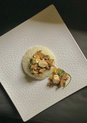 A picture of Spicy Tofu - Tuna with Stir fry Spinach.