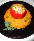 Red bell peppers stuffed with oregano chicken on sweet potatoes puree