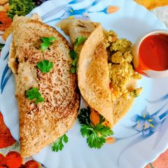 A picture of Gola Roti With Stuffed Egg Bhurji.