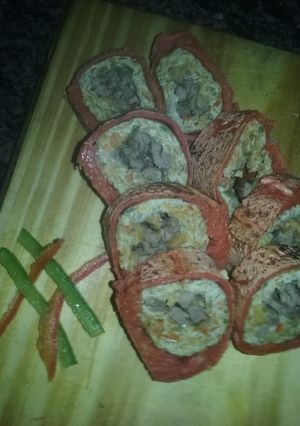 Una foto de Rolls de zanahoria y bife de chorizo