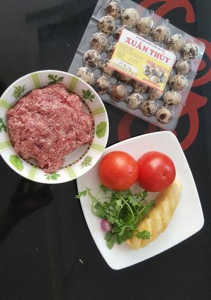 Hình của món Bò viên trứng cút xốt cà.