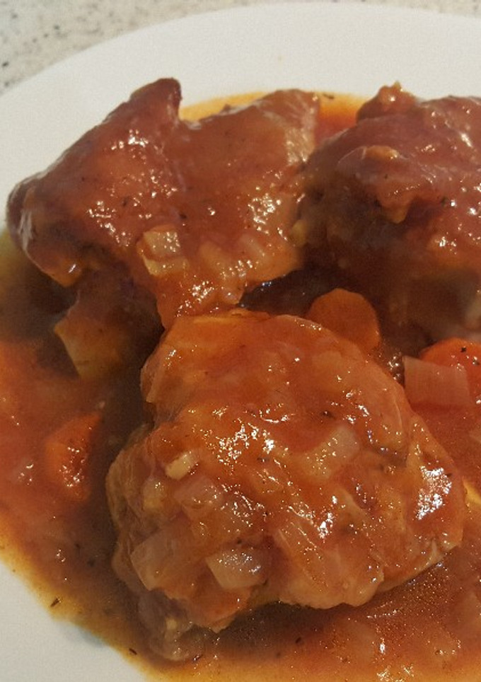 Una foto de Manitas de cerdo guisadas