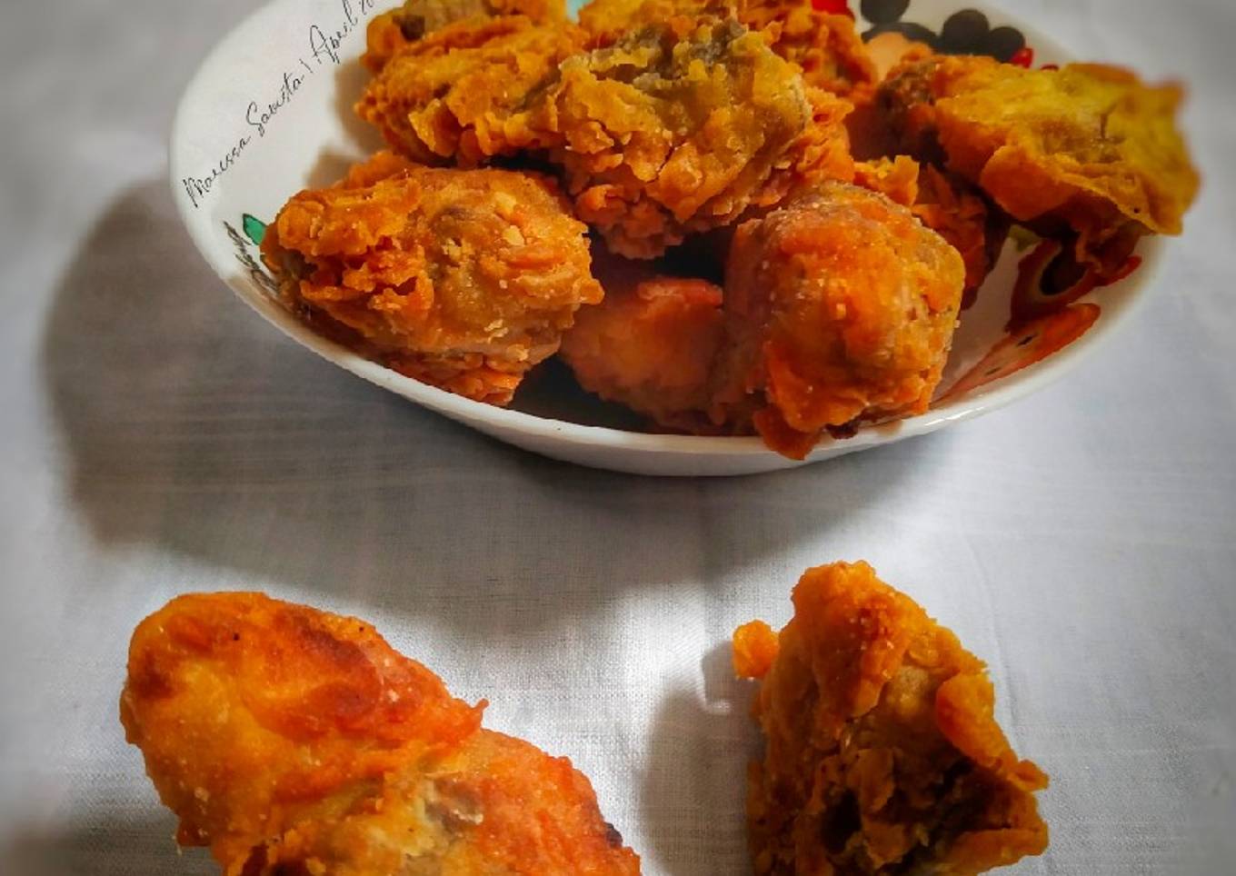 51. Ayam disaring dengan tepung