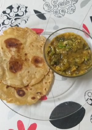 A picture of Visrati VangiTuria Pana Sabji with paratha.