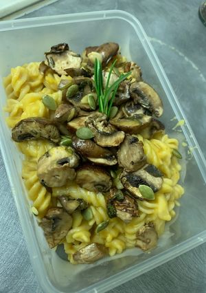 A picture of Mushroom pasta with pumpkin sauce (vegan).