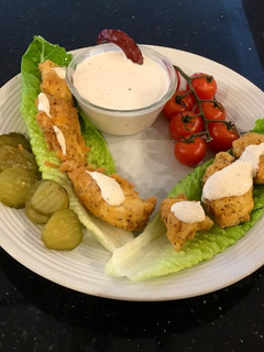 A picture of Spicy Chicken Strip Lettuce Wraps.