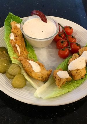 A picture of Spicy Chicken Strip Lettuce Wraps.