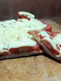Matambre de cerdo al horno con queso y tomate