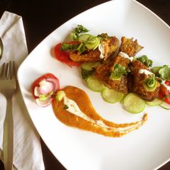 A picture of Ilish fish fry with spicy cream coconut sauce.