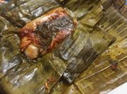 Una foto de tamales de maíz pollo