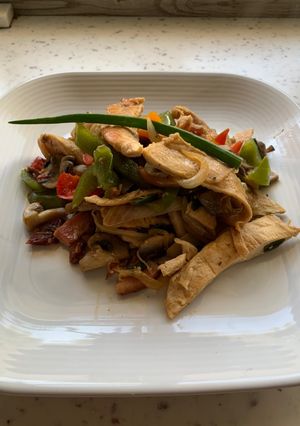 Una foto de Fajitas de pollo y tocino