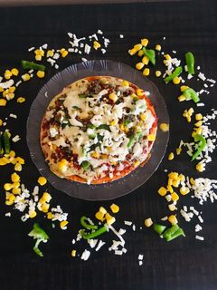 ચીઝ બર્સટ પીઝા (Cheese Burst Pizza Recipe in Gujarati) રેસીપી મુખ્ય ફોટો