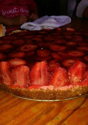 Una foto de Cheesscake de ricotta y frutilla