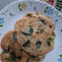 A picture of Green peas leaves & Raw chickpeas Chila.
