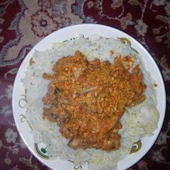 A picture of Rice with spag and egg sauce.