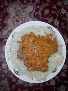 A picture of Rice with spag and egg sauce.