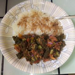 Moringa salad with white rice A picture of Moringa salad with white rice.