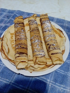 Una foto de Panqueques con dulce de leche