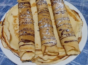 Una foto de Panqueques con dulce de leche