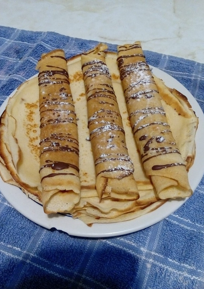 Una foto de Panqueques con dulce de leche