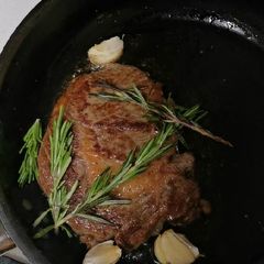 A picture of Ribeye steak, chimichuri.