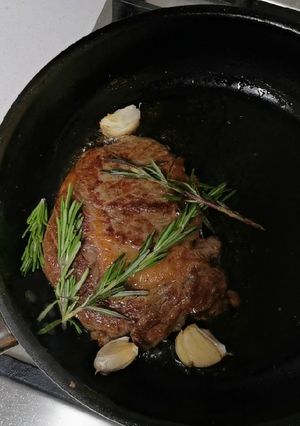 A picture of Ribeye steak, chimichuri.
