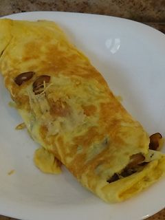 Una foto de Tortilla de boletus y queso
