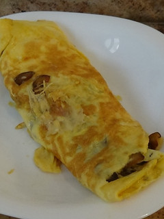 Una foto de Tortilla de boletus y queso