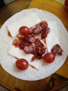 Una foto de Tortita de lomo y salchichas