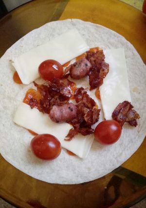 Una foto de Tortita de lomo y salchichas