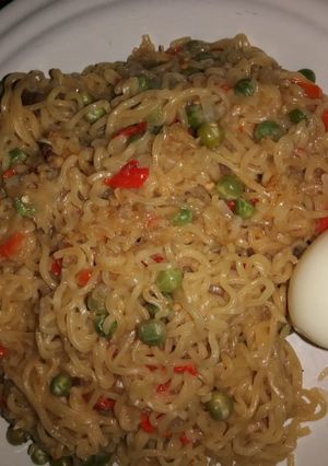 A picture of Veggies noodles with egg.