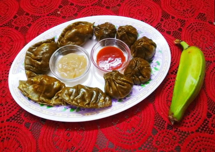 Steamed Green Momos with Raw Banana Filling