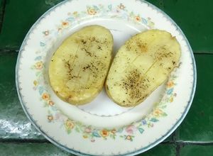 Una foto de Papas en mitades al horno