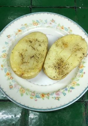 Una foto de Papas en mitades al horno