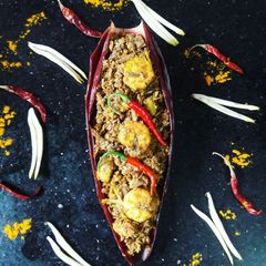 A picture of Banana flower with prawn cury (mocha_chingri_ghonto).