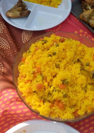 Une photo de Riz au curcuma petit pois et carotte