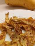 Crujientes de Piel de Patata Asada al Aroma de AOVE y Pimienta Negra